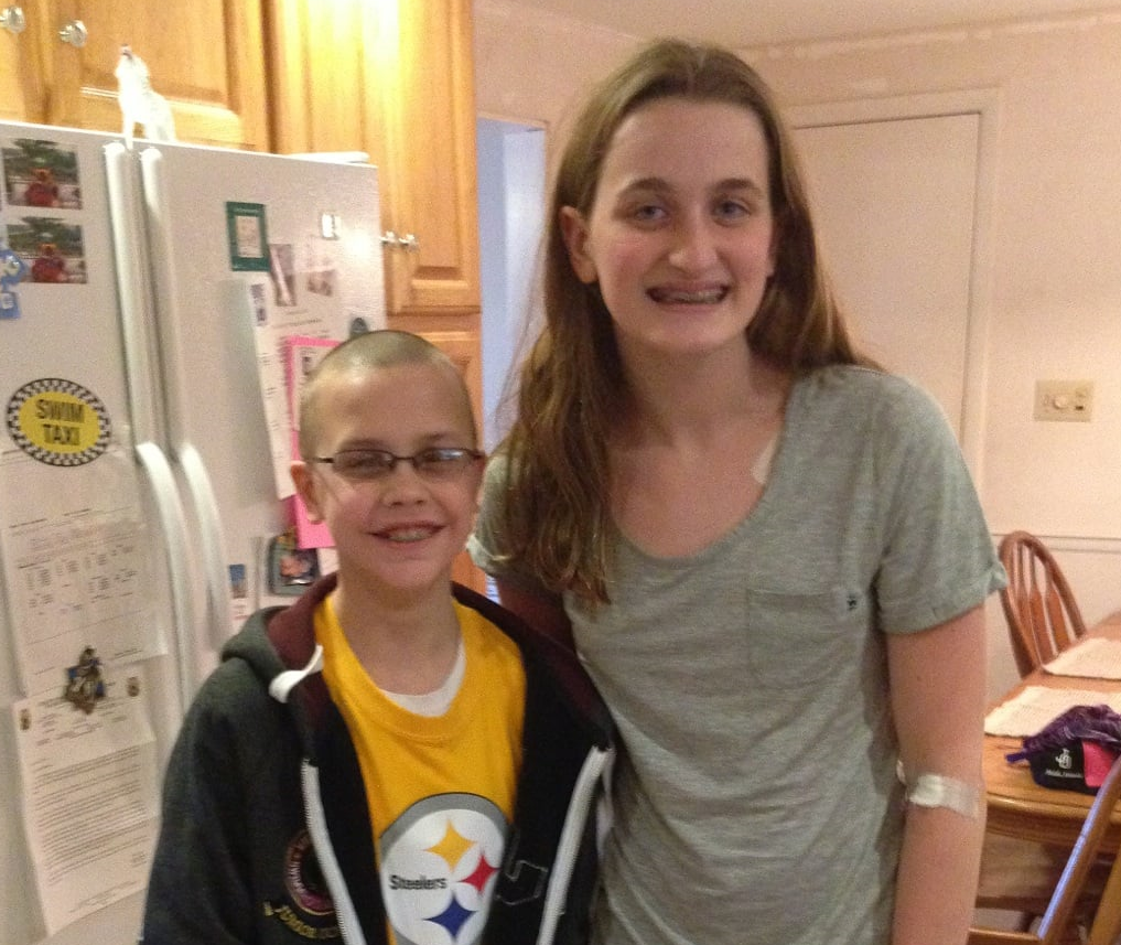 Shannan, with the young boy who saved her life.