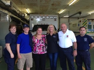 Bailey with the team of rescuuer that helped save his life